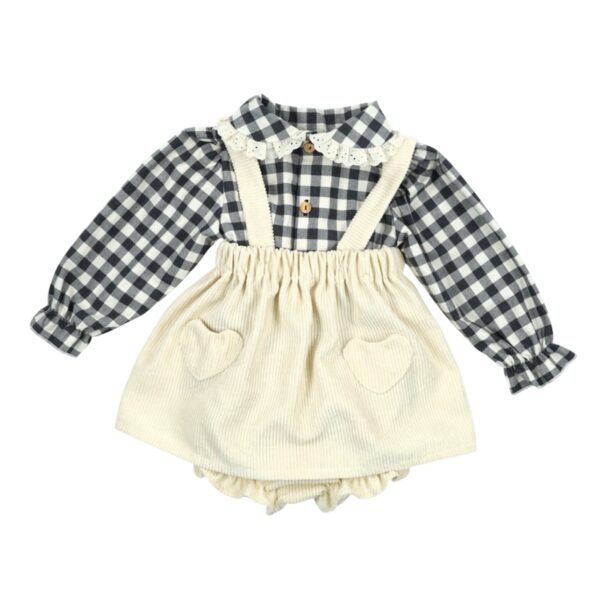 Falda con tirantes y blusa NOIR